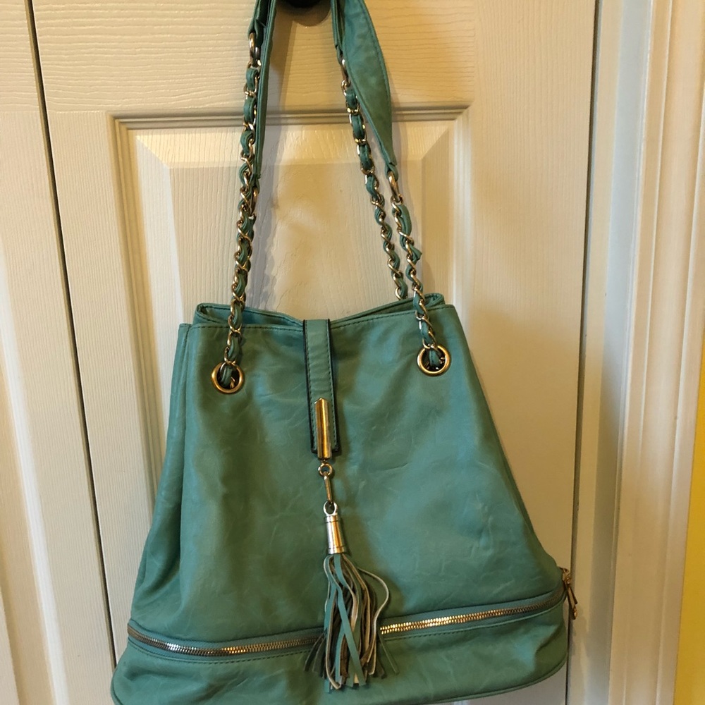 light turquoise/ teal purse